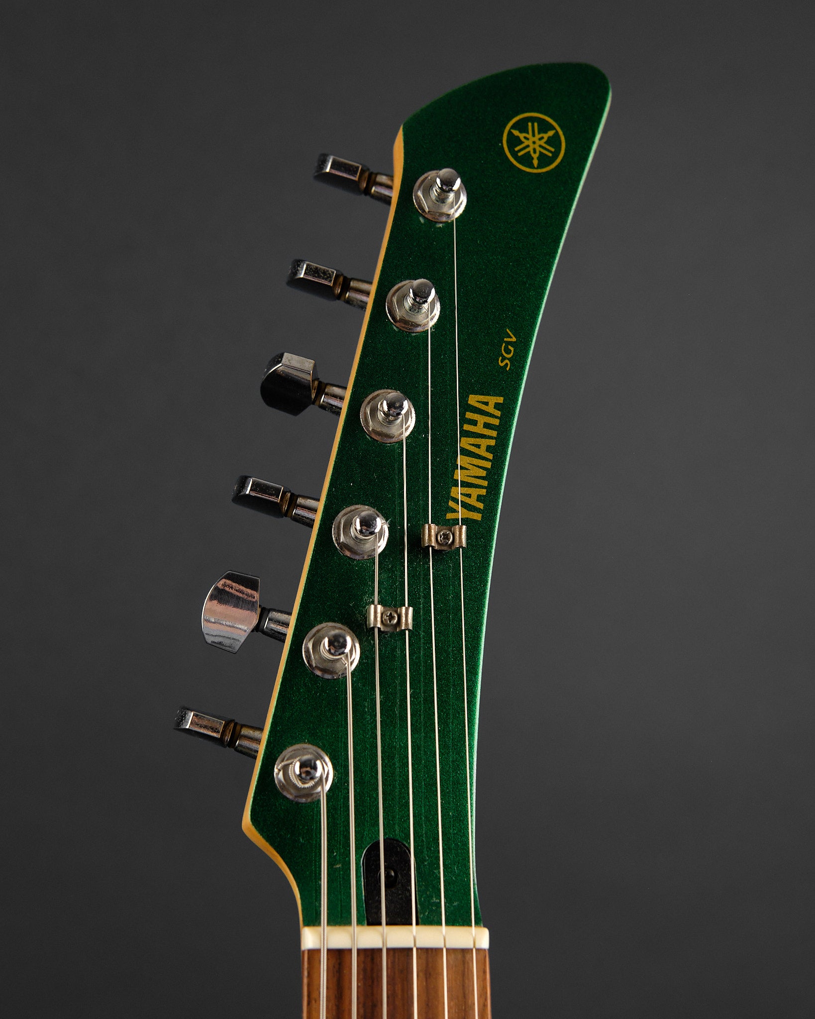 2000 Yamaha SGV-300 Flying Samurai Metallic Green - headstock front | Replay Guitars